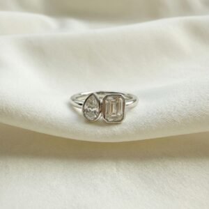 טבעת יהלומי אמרלד וטיפה ושיבוץ מסגרת